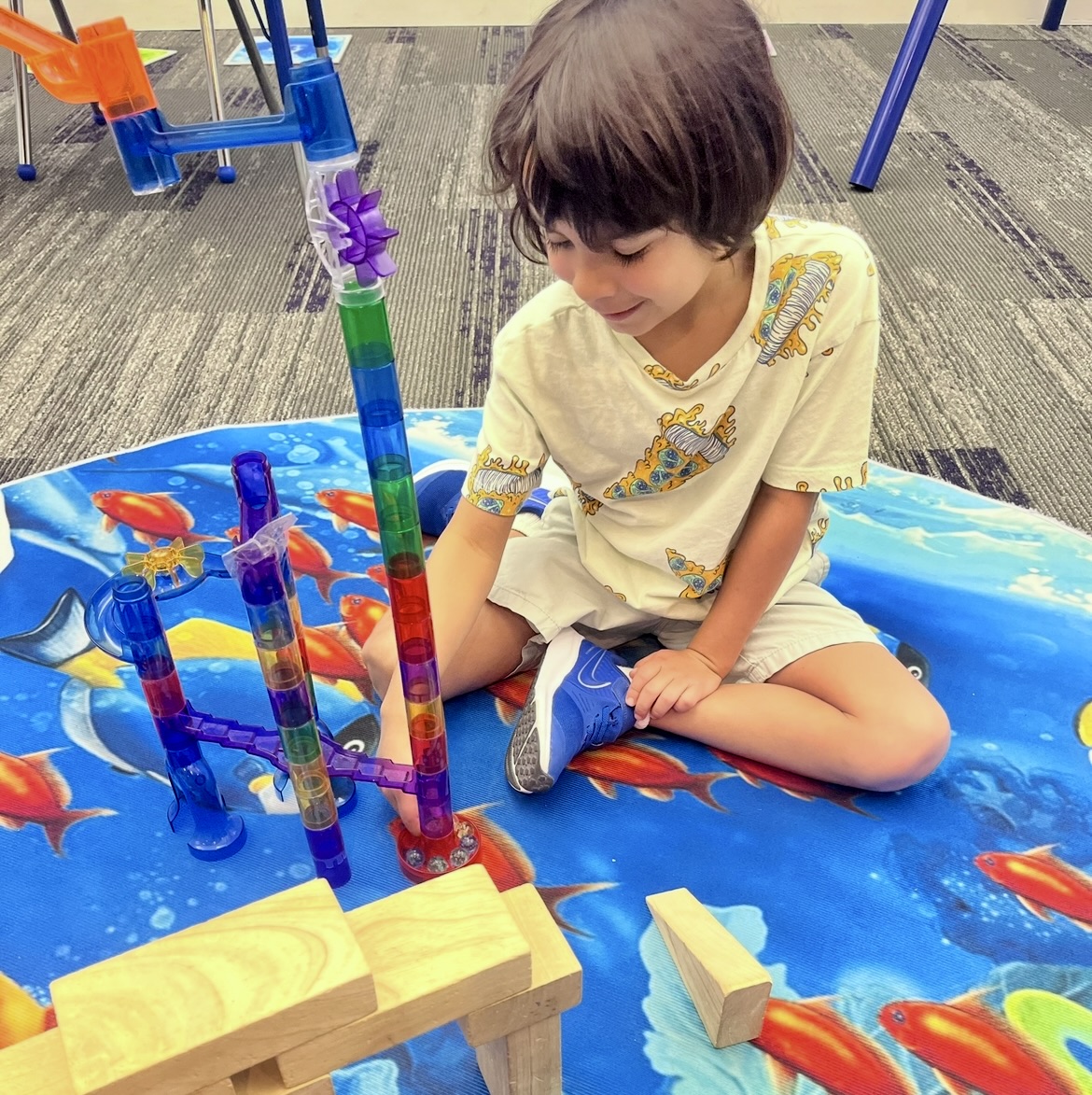 ABA therapist playain with child in Kendall, FL